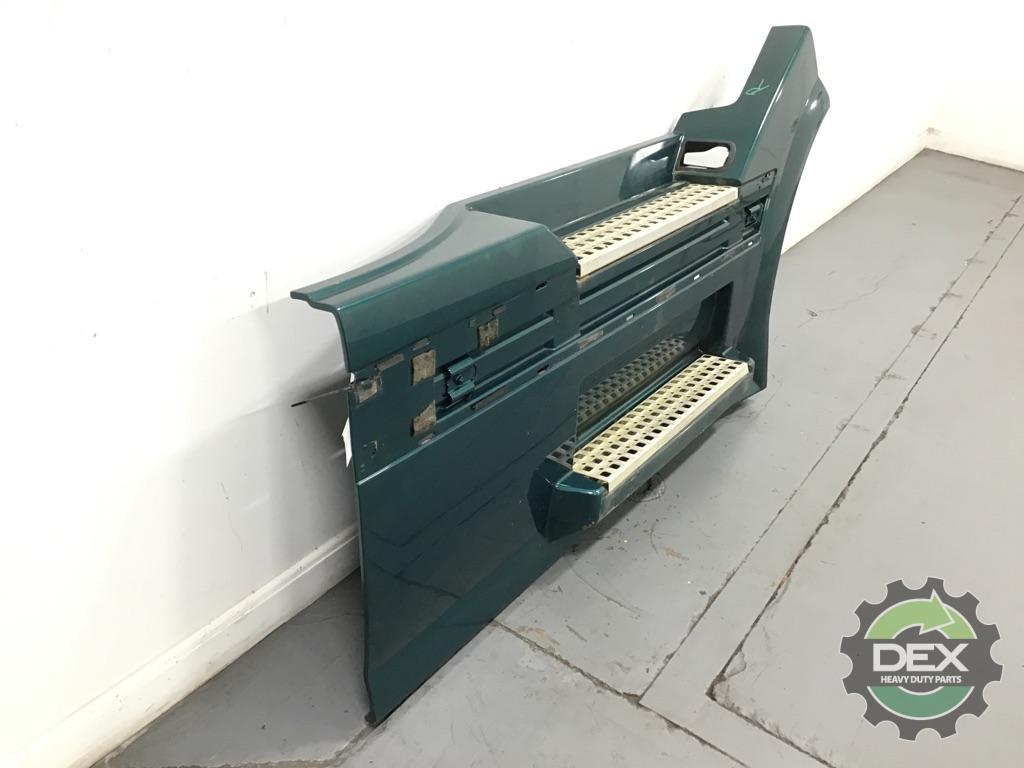 Volvo VNL small wheel opening RH front chassis fairing with steps